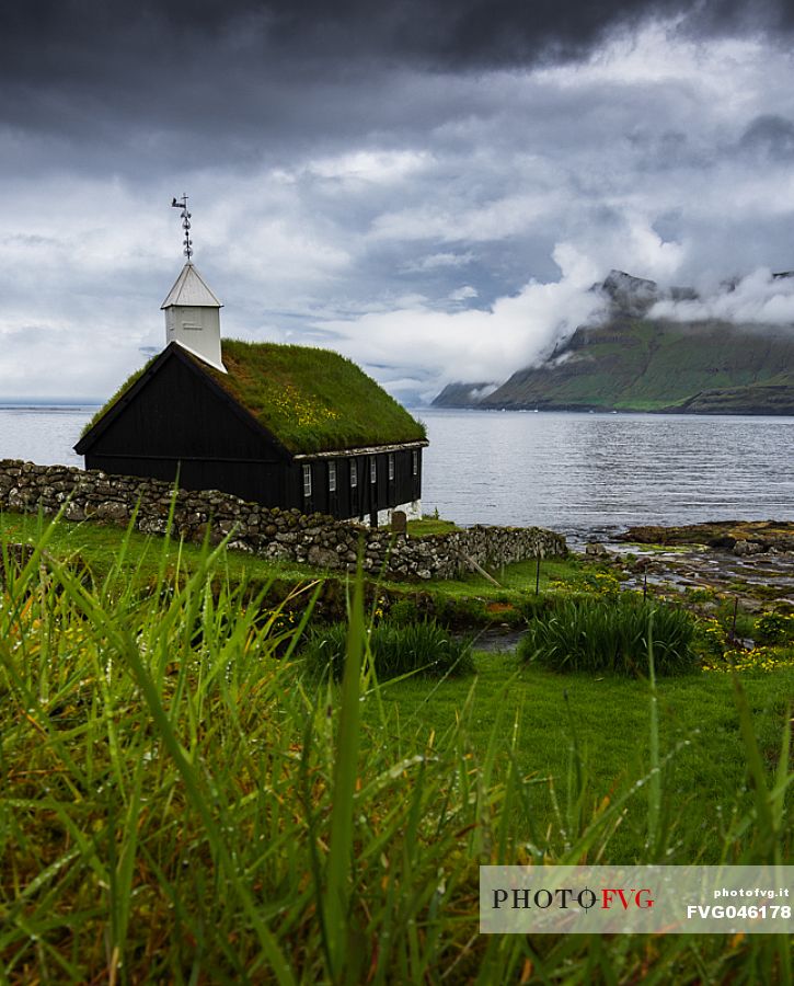 Traditional church of Funningur village,  Eysturoy island, Faeroe islands, Denmark, Europe